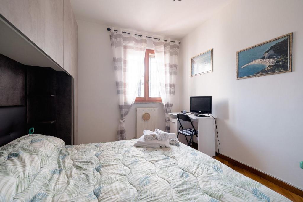 Postel nebo postele na pokoji v ubytování Les Chambres