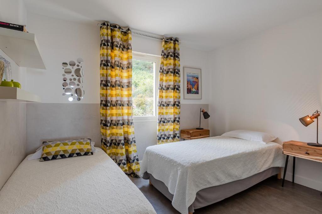 Postel nebo postele na pokoji v ubytování STELLA MARE
