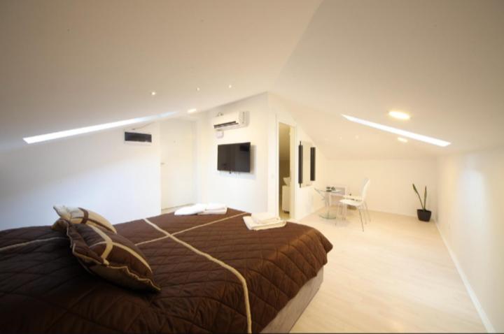 Postel nebo postele na pokoji v ubytování Agent Lux Apartments