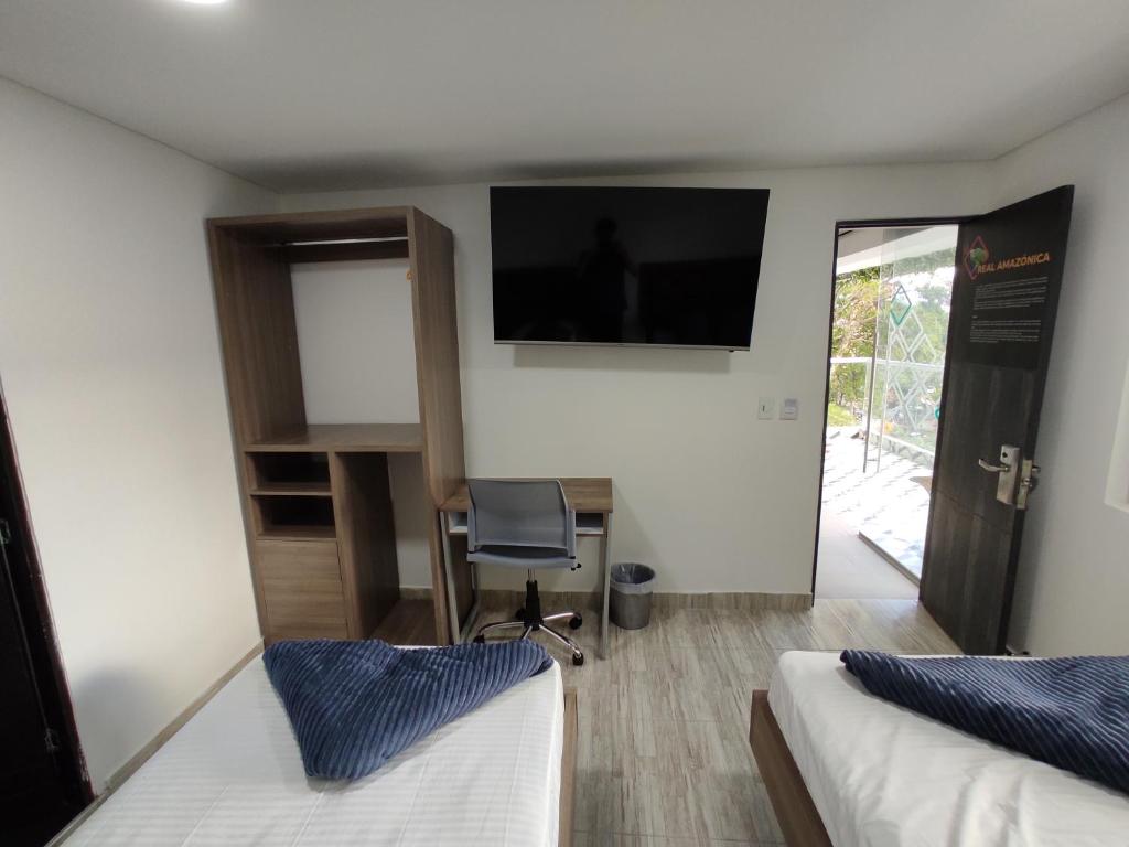 Postel nebo postele na pokoji v ubytování Hostel Boutique Nido de Loros