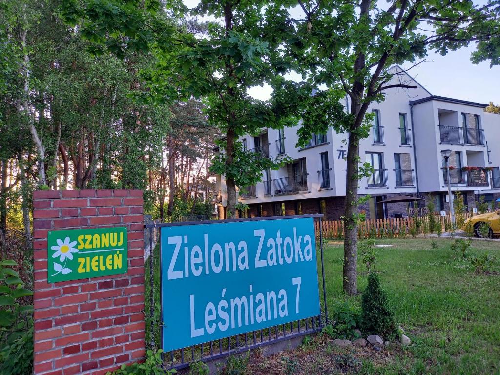 a sign for the zeki zeki zeki zekiakuja in front at Leśny Kąt in Ustka