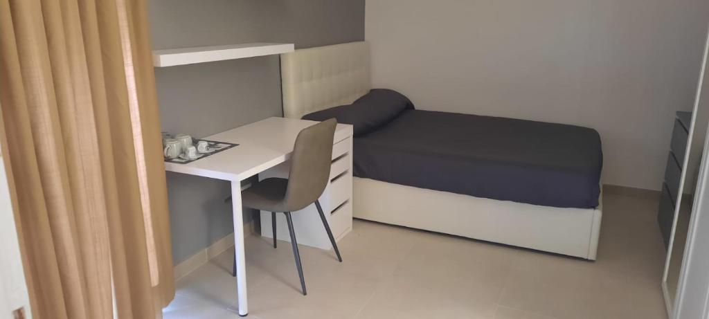 Postel nebo postele na pokoji v ubytování Panorama Lecce