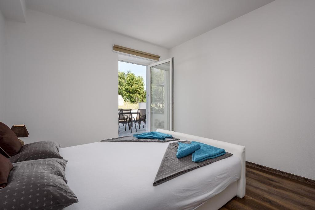 Postel nebo postele na pokoji v ubytování Apartment Monika with private pool in Porec