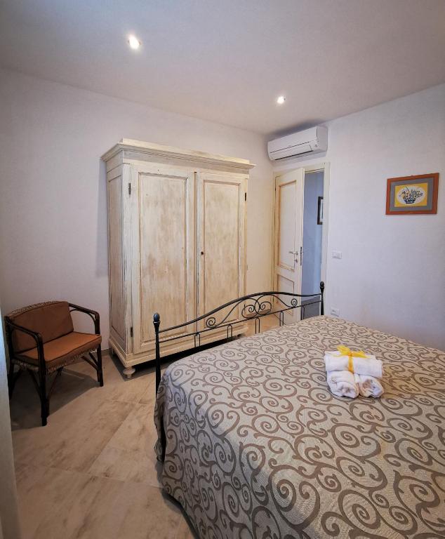 Posteľ alebo postele v izbe v ubytovaní Agriturismo Sotto la Rocca