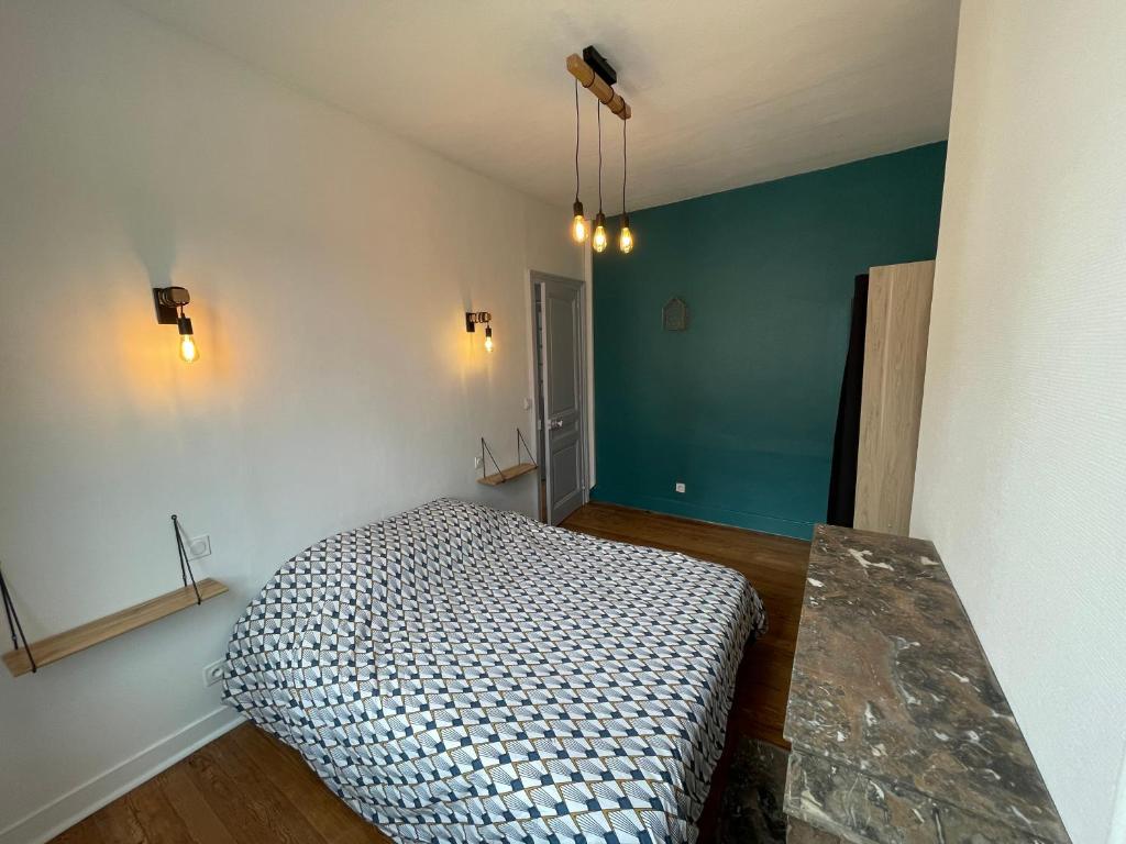 Кровать или кровати в номере Appartement Chic F2 Centre-ville