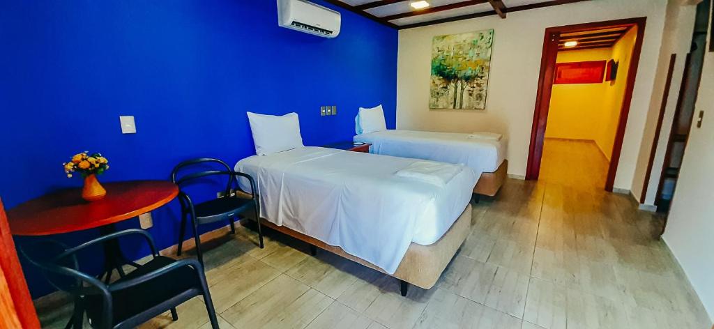 Postel nebo postele na pokoji v ubytování Porto Preguiças Resort