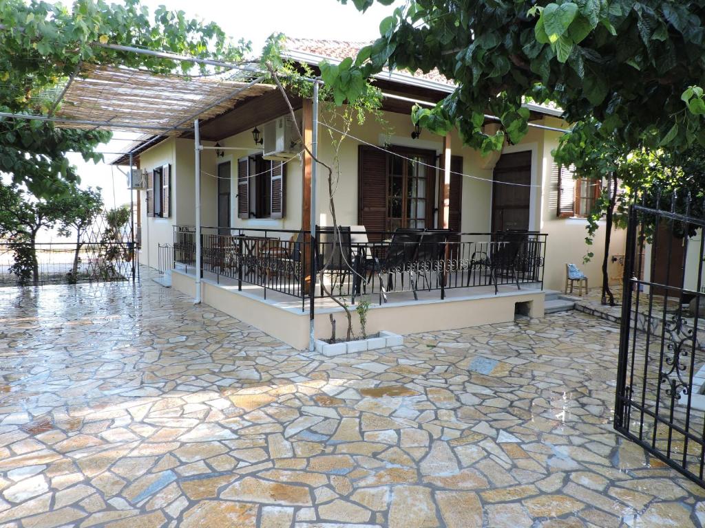 a patio in front of a house at Calm house in Sivros village, Lefkada in Sívros