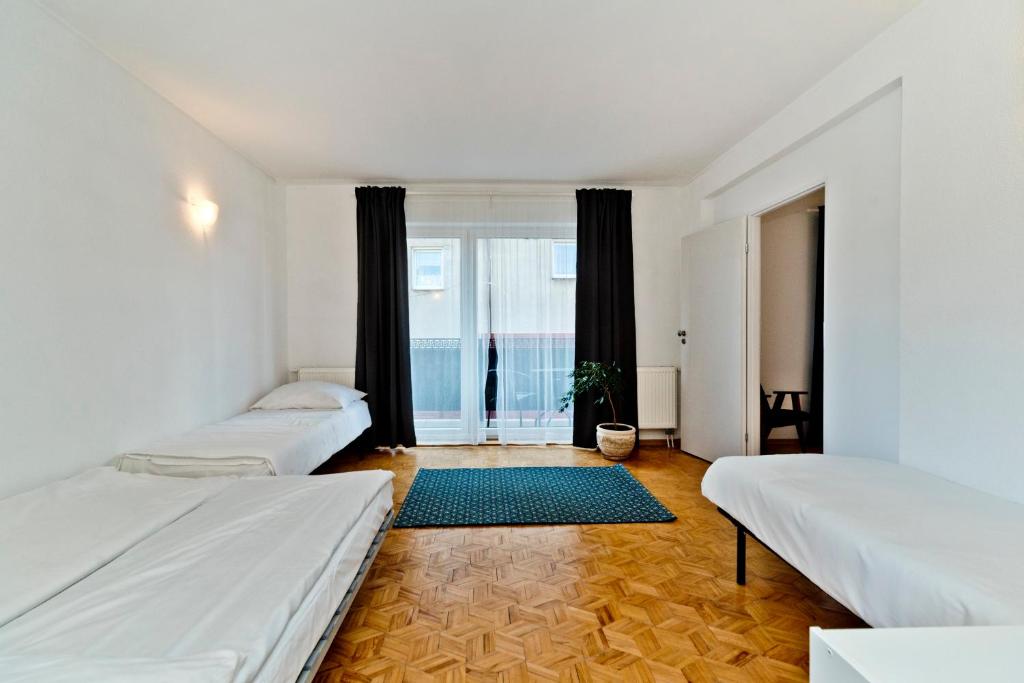 Postel nebo postele na pokoji v ubytování Kwatery Prywatne am Meer