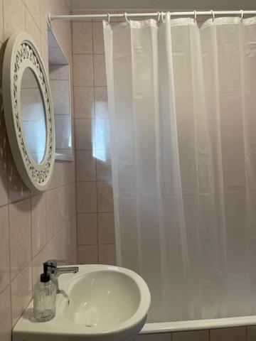 Kúpeľňa v ubytovaní BONI Apartman