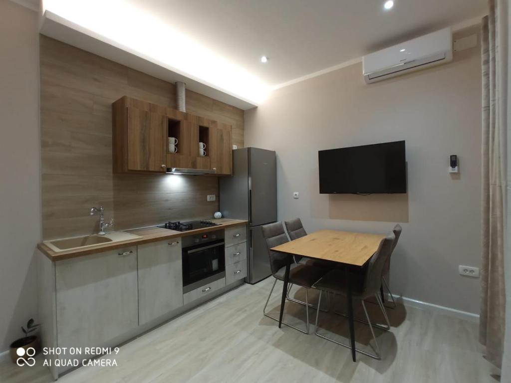 Kuchyň nebo kuchyňský kout v ubytování Villa Nina