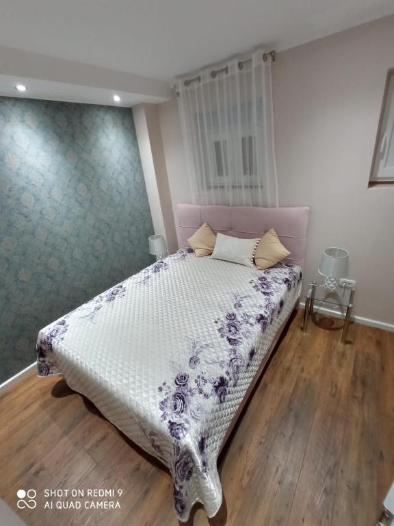 Postel nebo postele na pokoji v ubytování Villa Nina