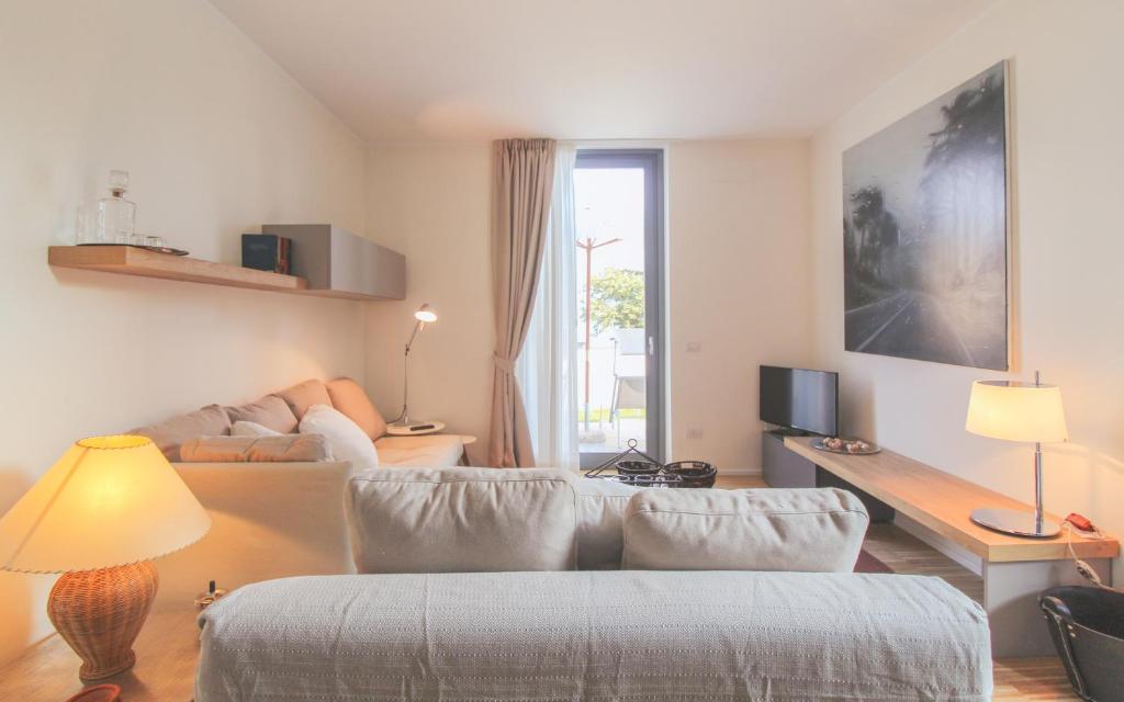 Televízia a/alebo spoločenská miestnosť v ubytovaní Residenza I Melograni - Suite