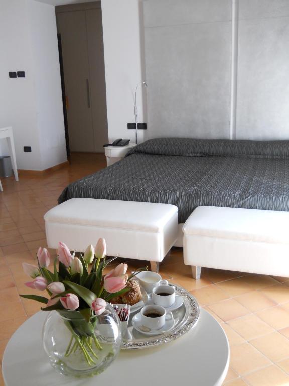 Postel nebo postele na pokoji v ubytování Miglio d'Oro Park Hotel