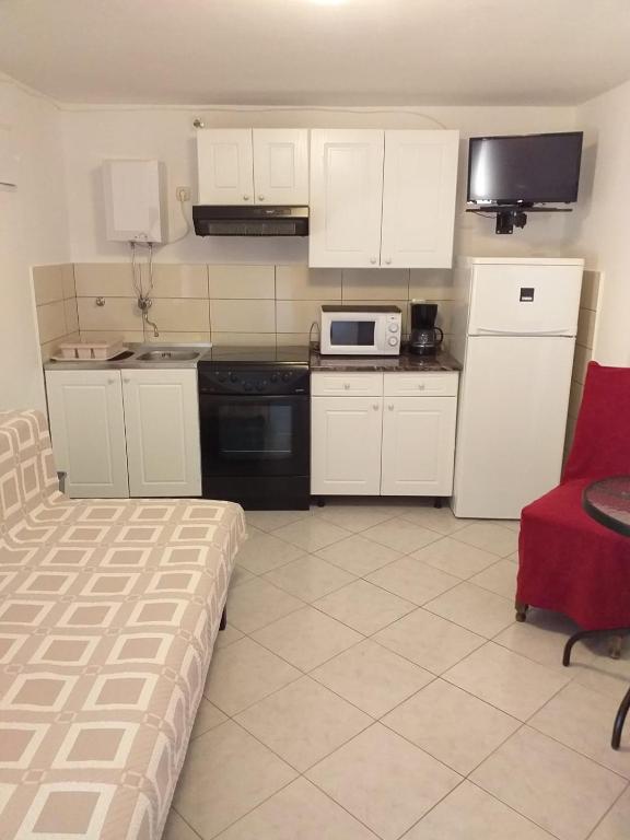 Kuchyň nebo kuchyňský kout v ubytování Apartments Julia & Nika
