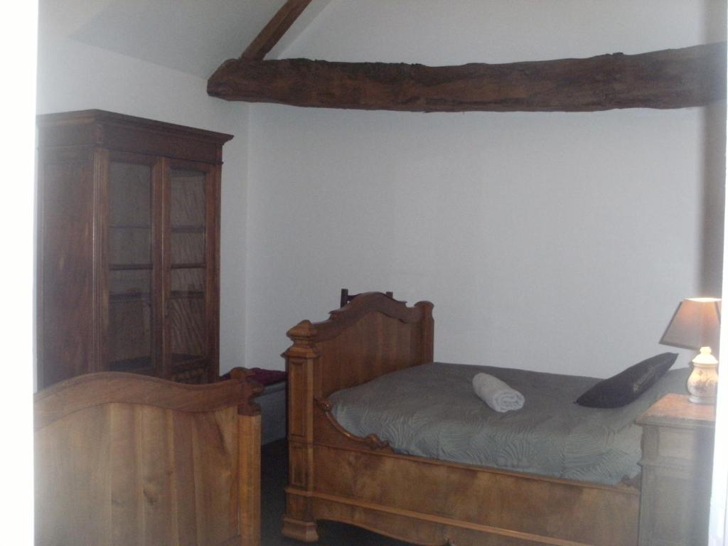 Postel nebo postele na pokoji v ubytování grange dans ancien corps de ferme