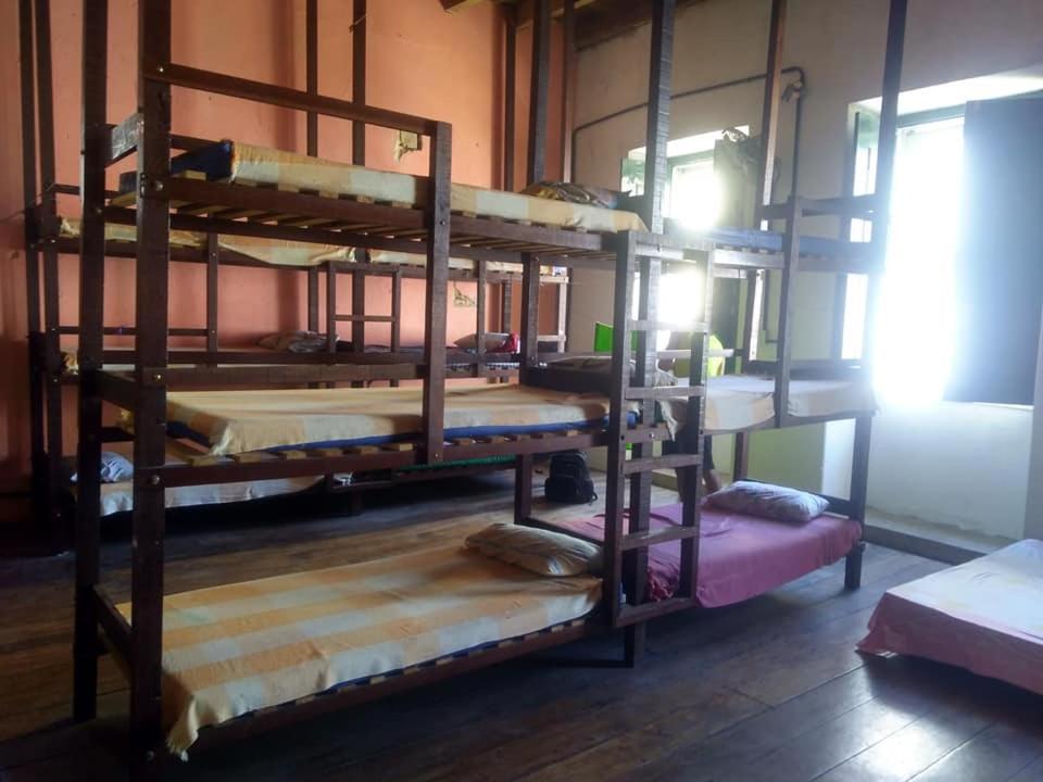Postel nebo postele na pokoji v ubytování Fusion Guesthouse