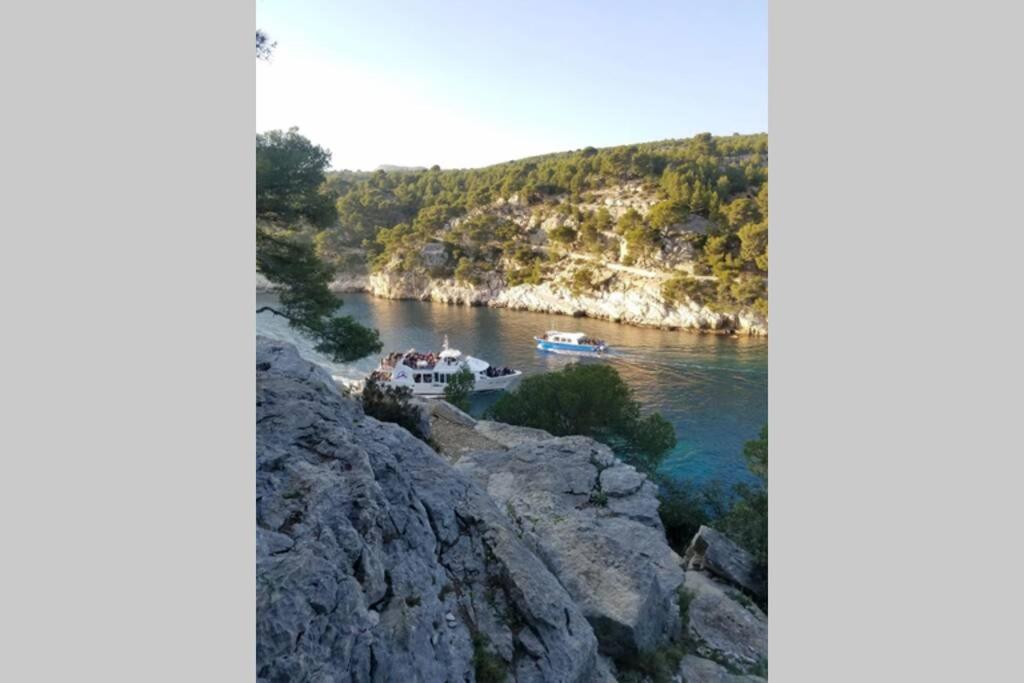 two boats in the water on a river at Calanques de Sormiou in Marseille