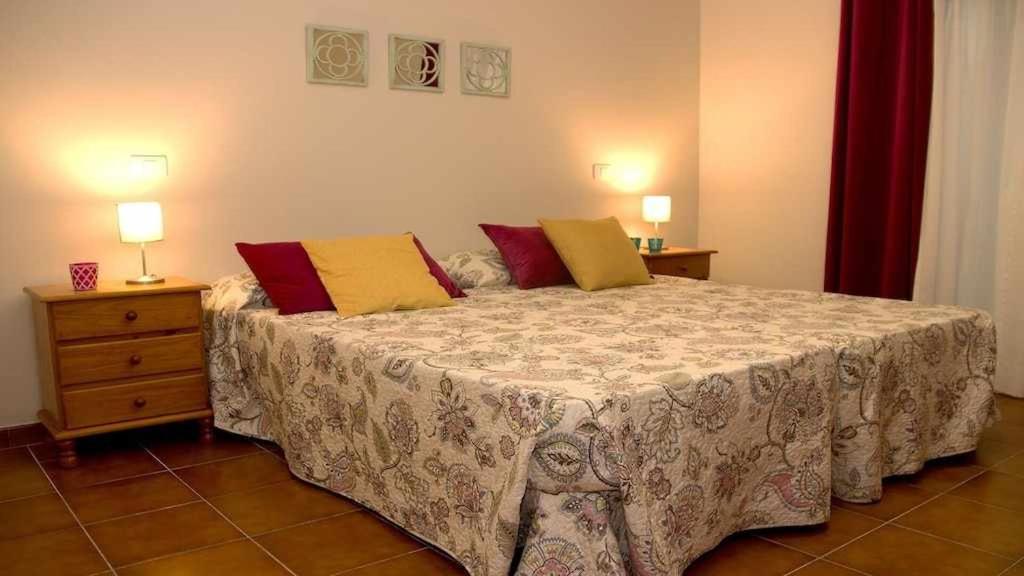 Postel nebo postele na pokoji v ubytování Apartamento con jardín y piscina B
