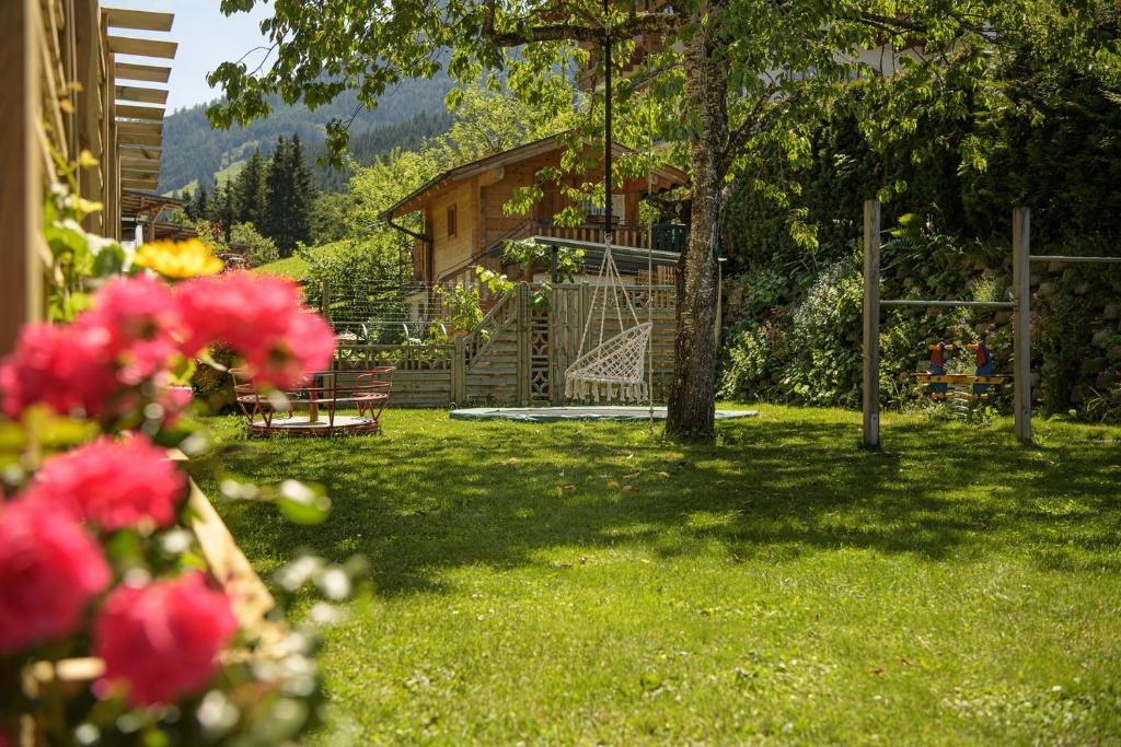 Vonkajšia záhrada v ubytovaní Alpen-Nest Großarl