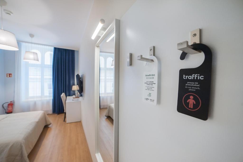 Posteľ alebo postele v izbe v ubytovaní Hotel Traffic Wrocław Stare Miasto