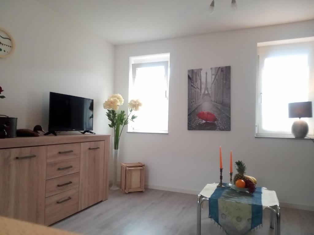 TV a/nebo společenská místnost v ubytování Ferienhaus Kir