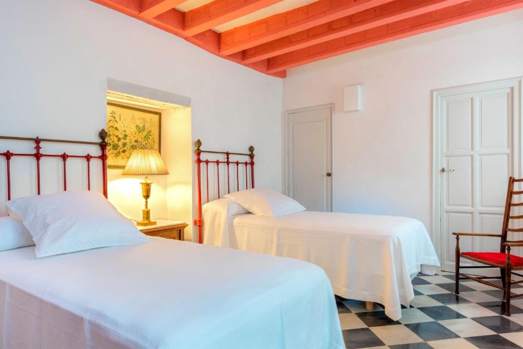 Posteľ alebo postele v izbe v ubytovaní Genteel Home Casa Alcázar
