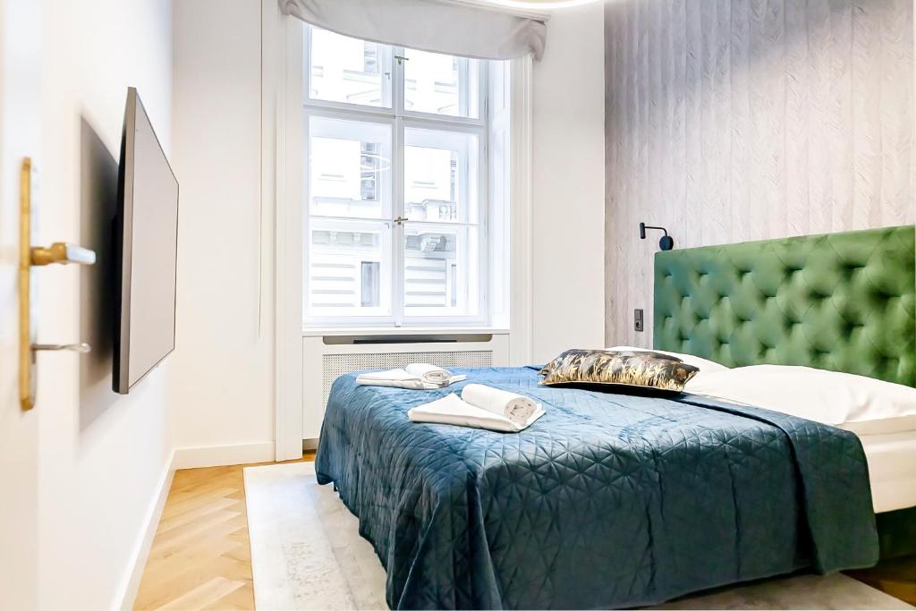 Postel nebo postele na pokoji v ubytování Luxury apartments in the city centre