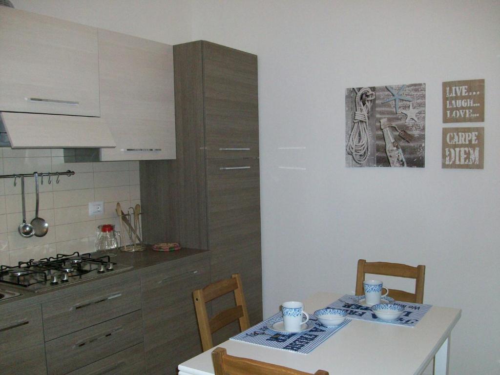 Kuchyň nebo kuchyňský kout v ubytování Villa Gardenia