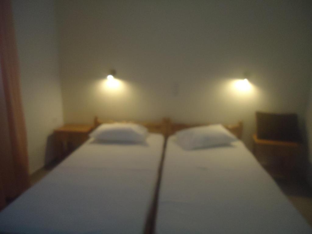 Postel nebo postele na pokoji v ubytování Balcony to Aegeon 1