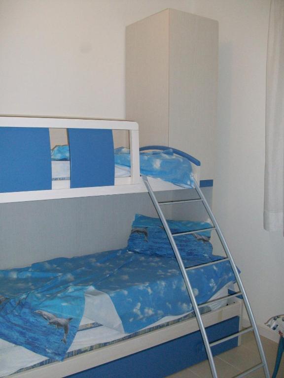 Postel nebo postele na pokoji v ubytování Villa Gardenia