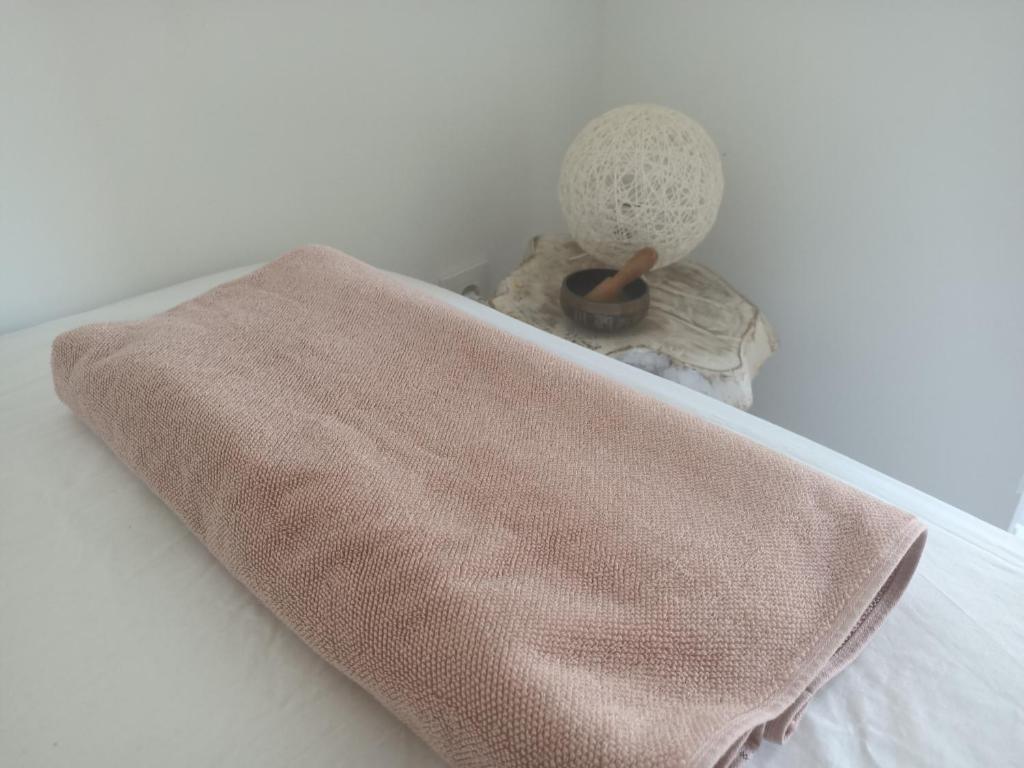 A bed or beds in a room at The Light appartment Tarragona