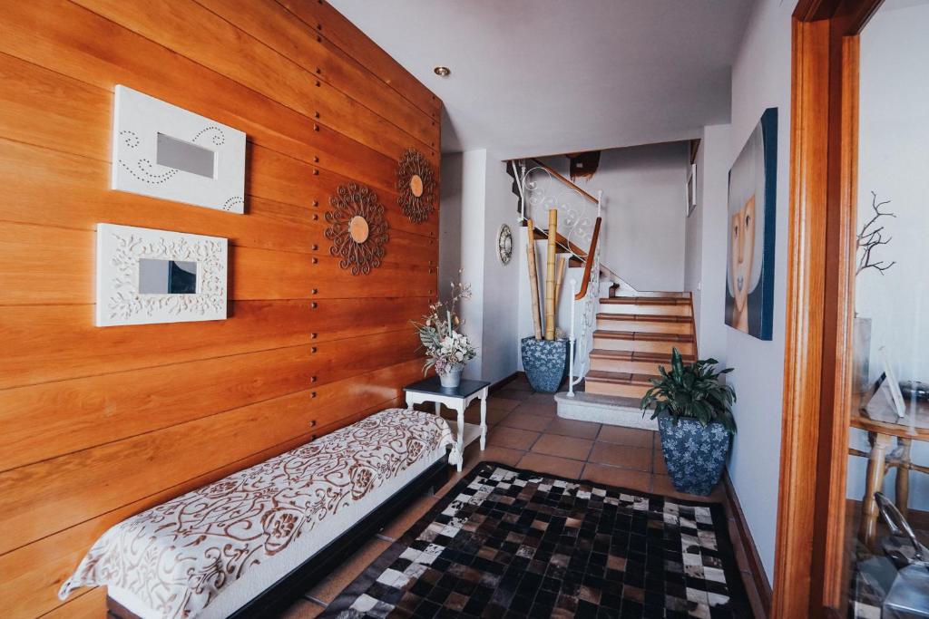 Postel nebo postele na pokoji v ubytování Villa con piscina a pie de playa