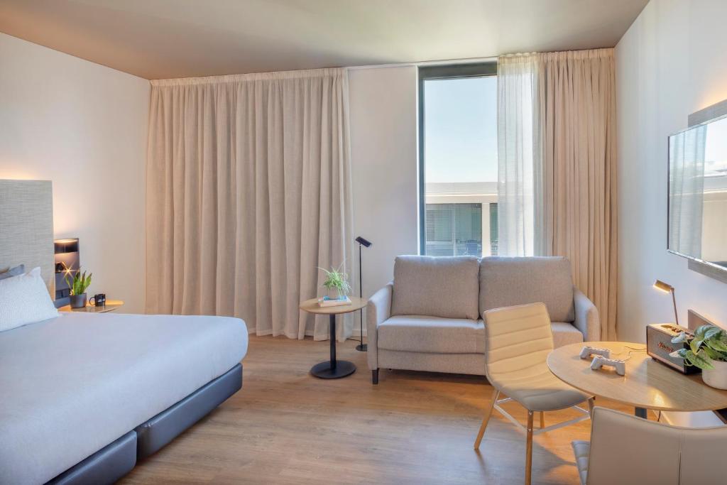 Postel nebo postele na pokoji v ubytování INNSiDE by Meliá Luxembourg