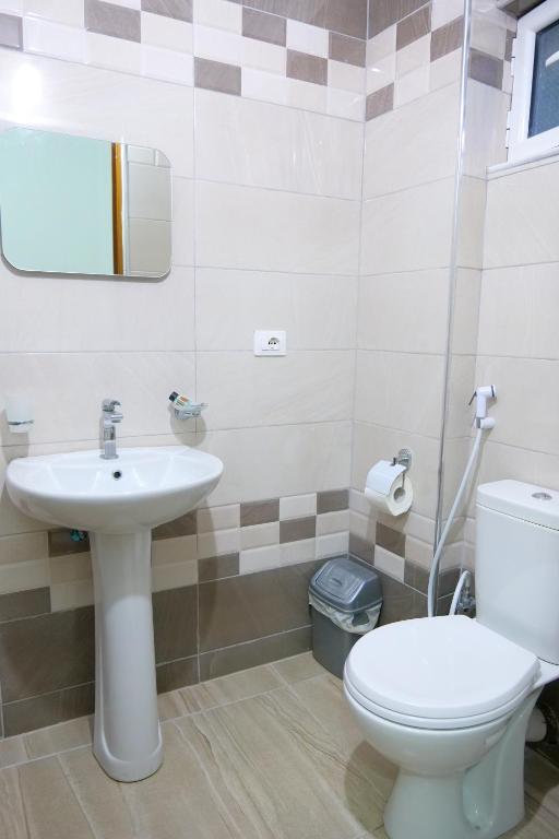 Koupelna v ubytování Hotel Rixhi