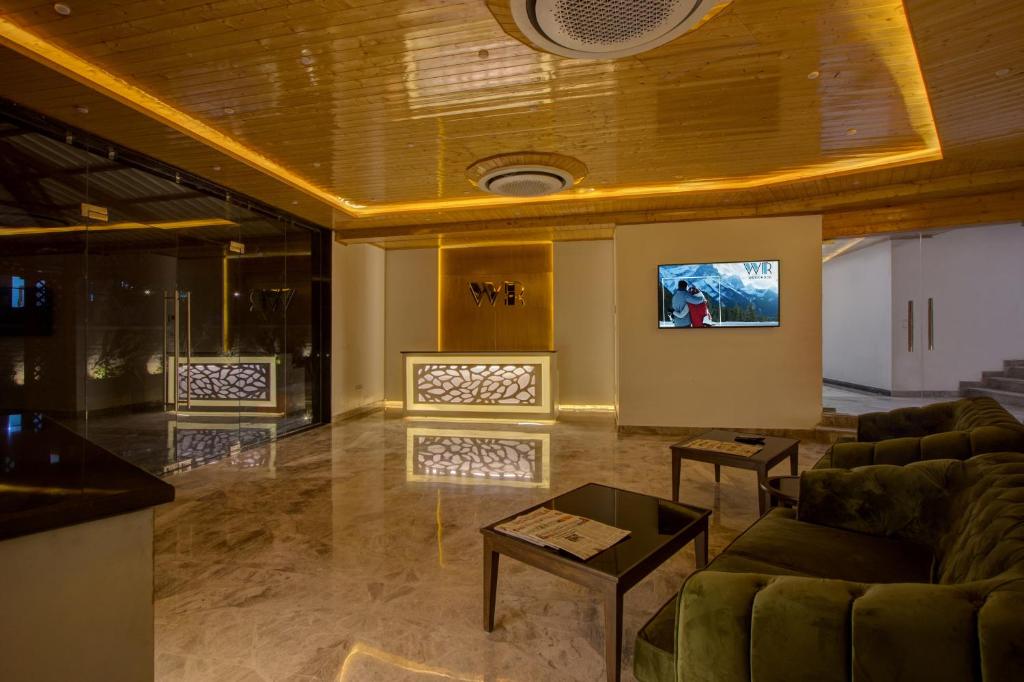 TV a/nebo společenská místnost v ubytování Woodrock Luxury Boutique Hotel