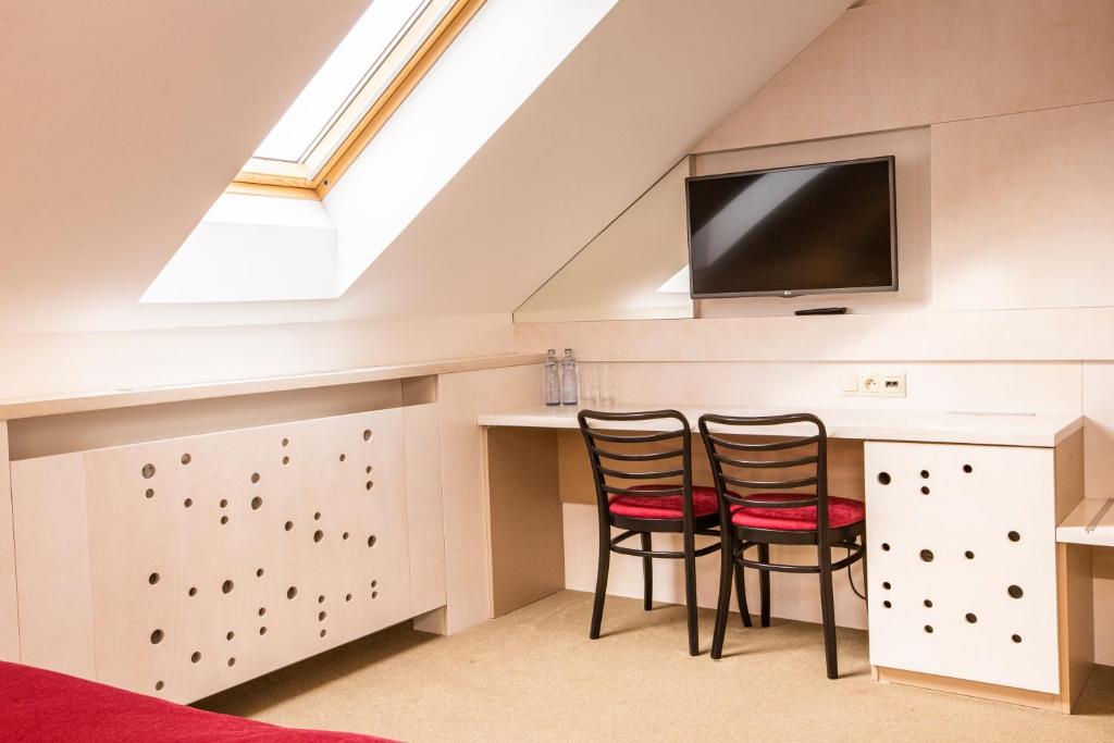 TV a/nebo společenská místnost v ubytování Hotel Olberg