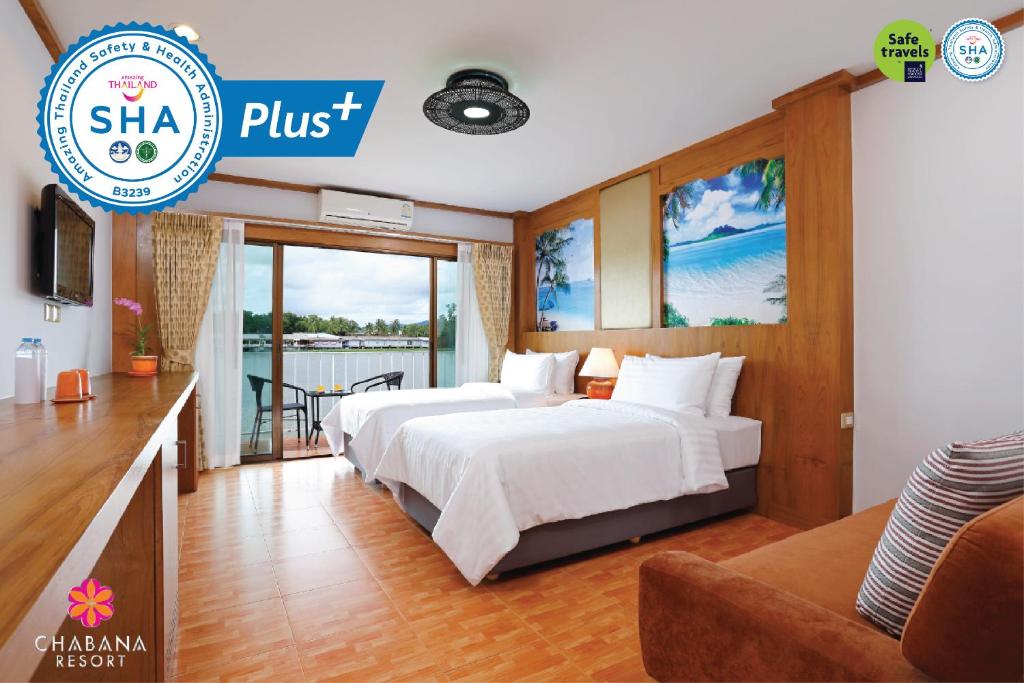 Postel nebo postele na pokoji v ubytování Chabana Resort Bang-tao Beach Phuket- SHA Extra Plus