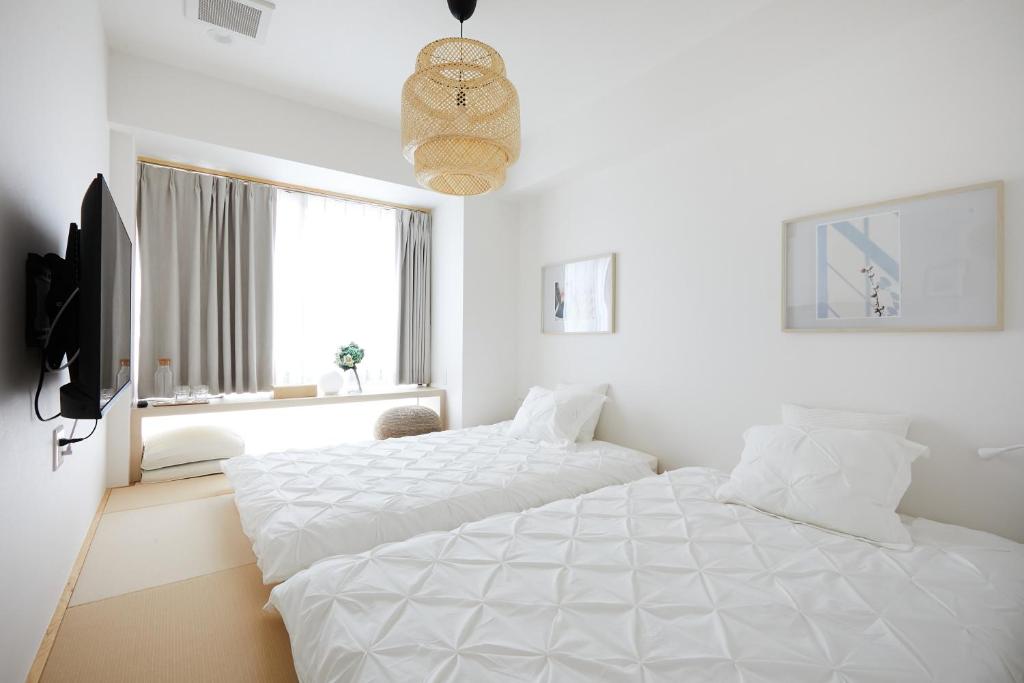 Postel nebo postele na pokoji v ubytování Designers Hotel Siesta