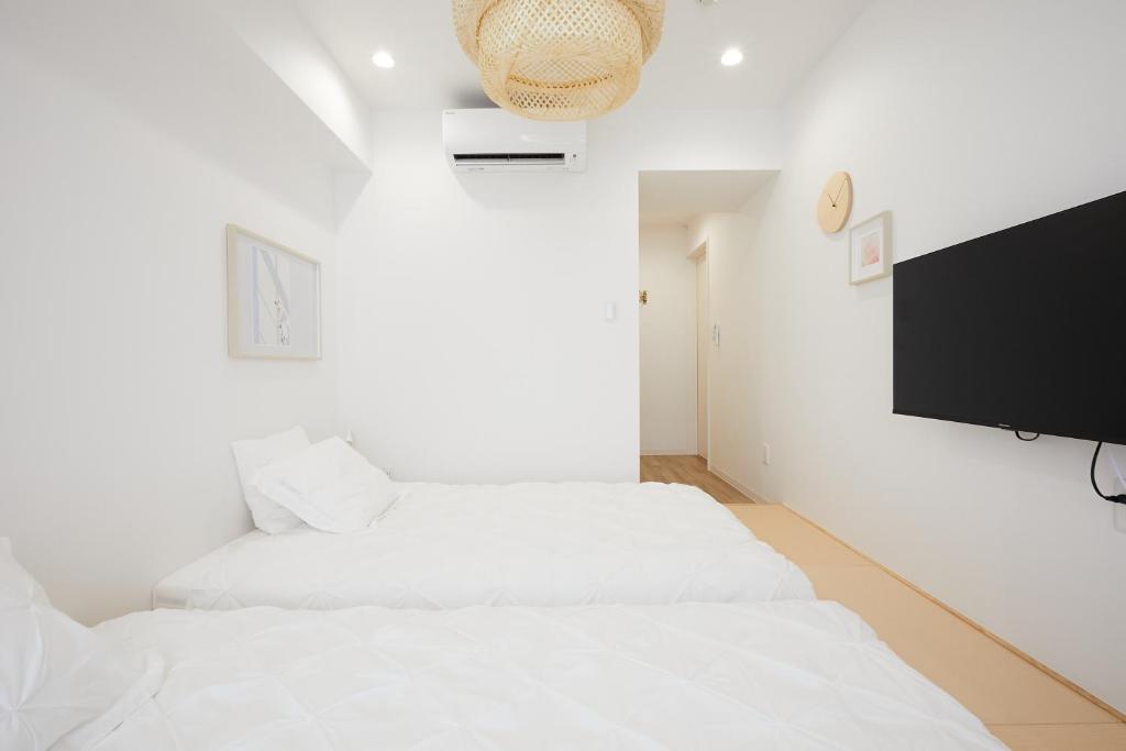 Postel nebo postele na pokoji v ubytování Designers Hotel Siesta