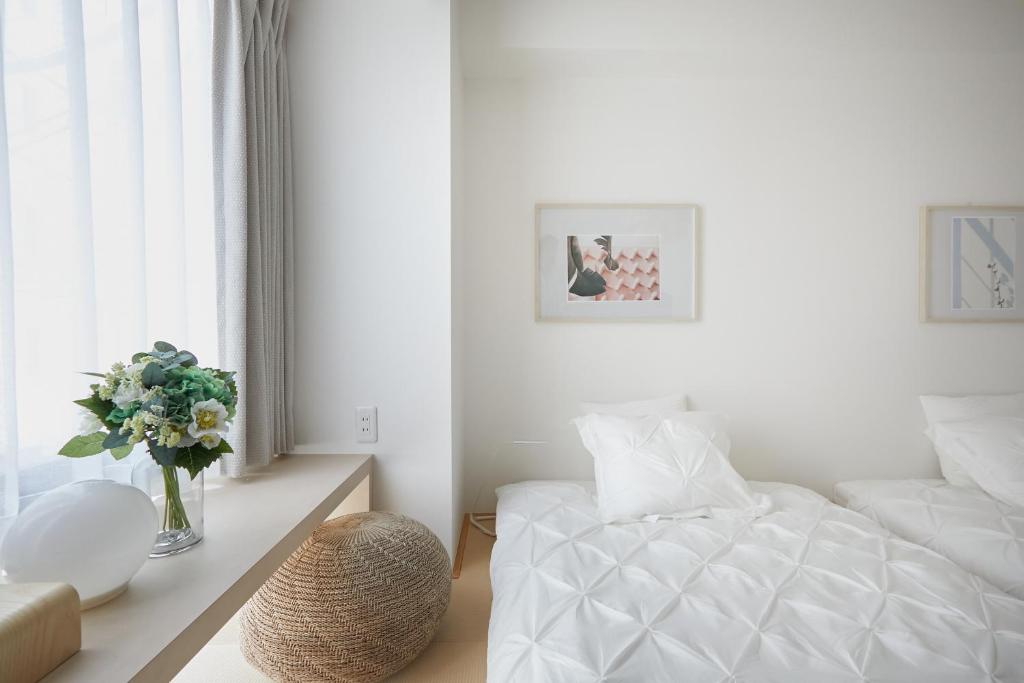 Postel nebo postele na pokoji v ubytování Designers Hotel Siesta