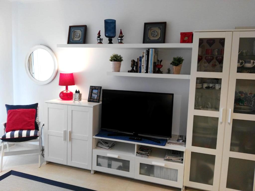 Telewizja i/lub zestaw kina domowego w obiekcie San Ciprian Marinero by I Love Norte