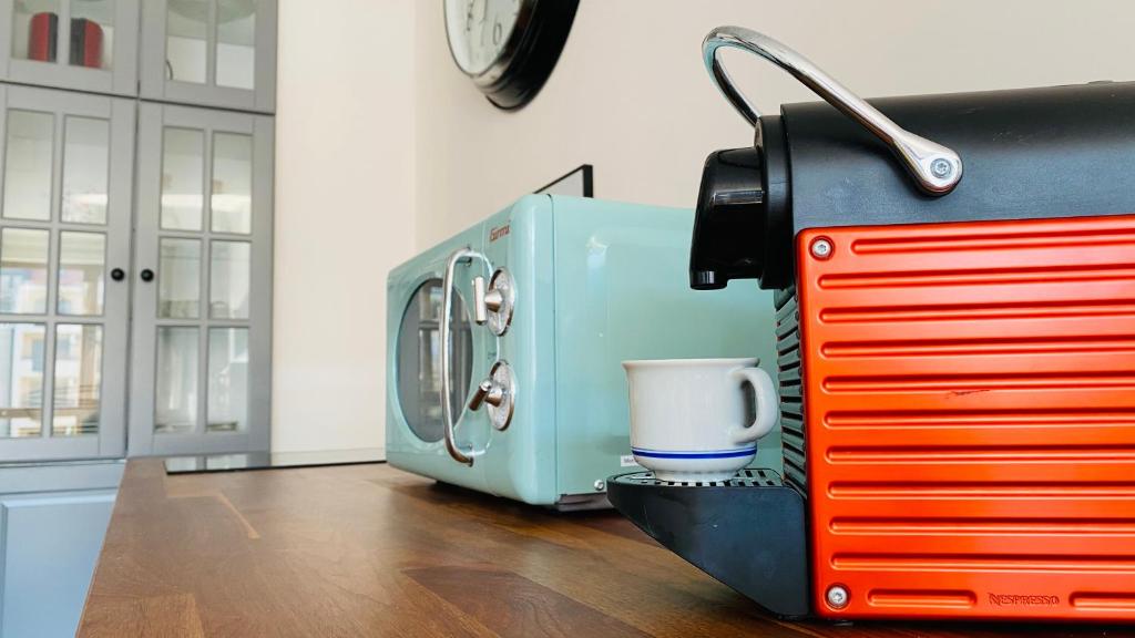 A kitchen or kitchenette at APARTELLO Modern Apartment - Balkan Breeze 7