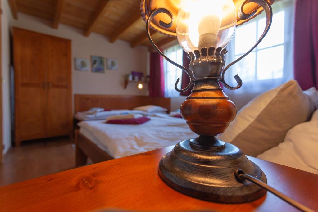 Postel nebo postele na pokoji v ubytování Chatka Aqua440 Tatralandia