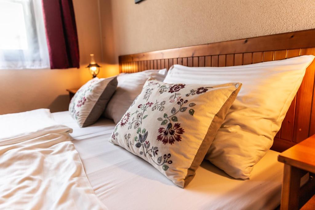 Postel nebo postele na pokoji v ubytování Chatka Aqua440 Tatralandia