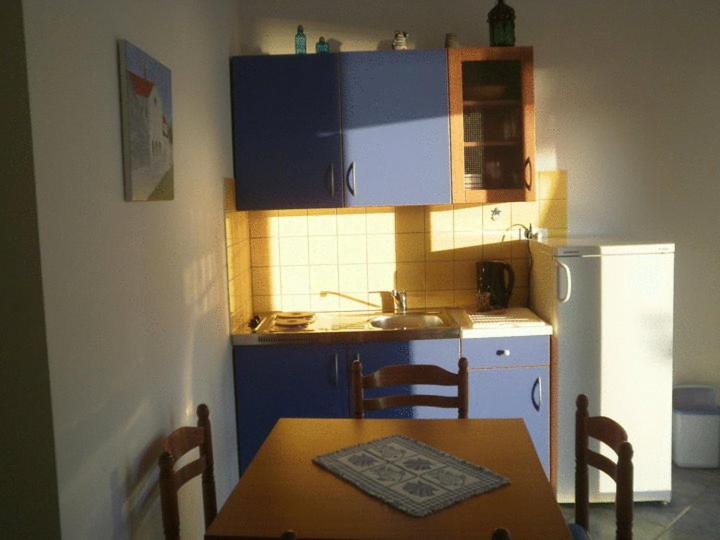 Kuchyň nebo kuchyňský kout v ubytování Apartments Mare More