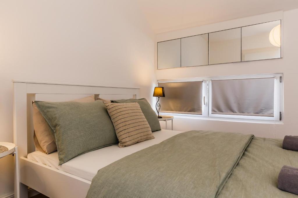Postel nebo postele na pokoji v ubytování Apartment Maestral