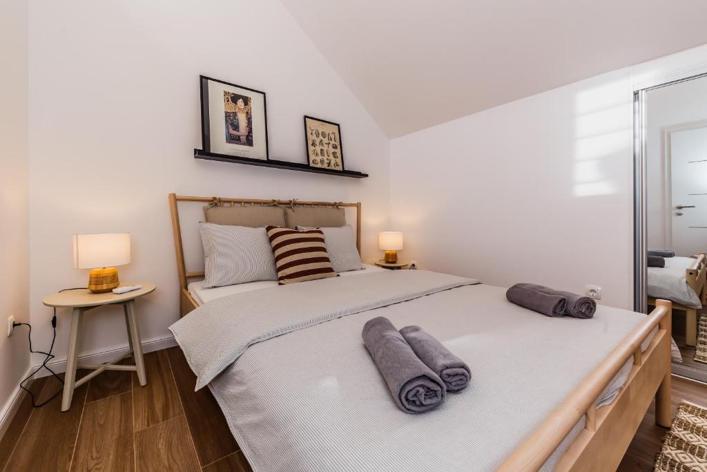 Postel nebo postele na pokoji v ubytování Apartment Maestral