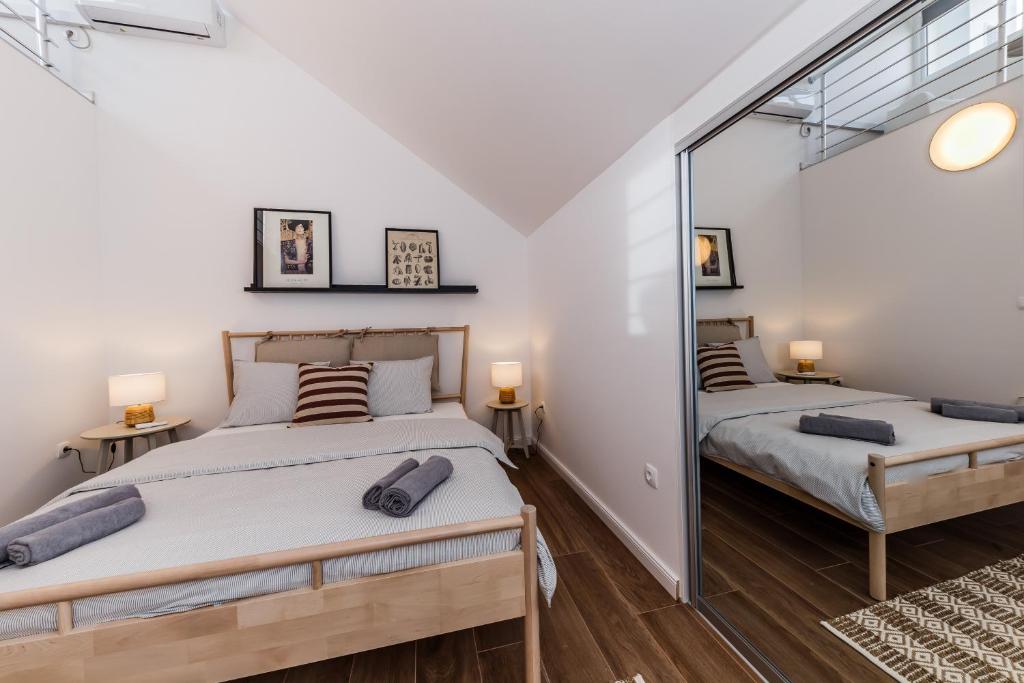 Postel nebo postele na pokoji v ubytování Apartment Maestral