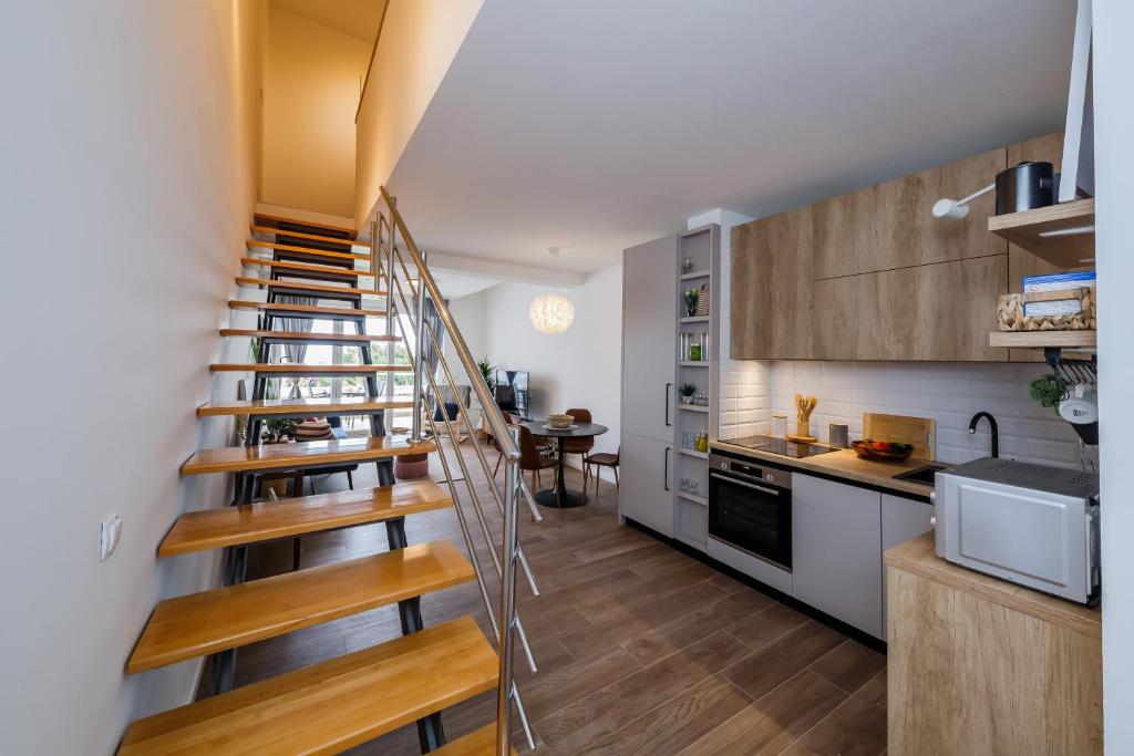 Kuchyň nebo kuchyňský kout v ubytování Apartment Maestral