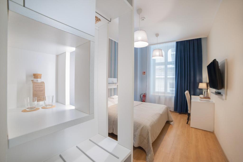 Posteľ alebo postele v izbe v ubytovaní Hotel Traffic Wrocław Stare Miasto